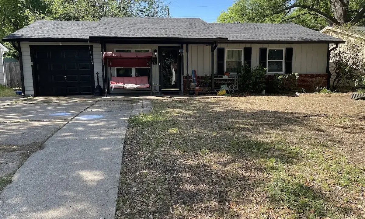 Asphalt Shingle Roof Repair crew at work on a residential roof in Milledgeville